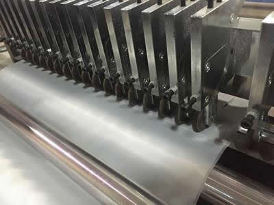 Ultrasonic ribbon slitting machine
